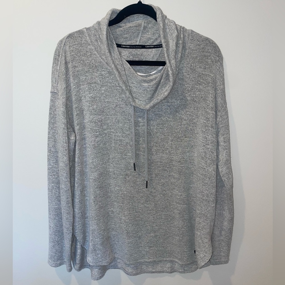 Grey cowl neck sweater with long sleeves and ties